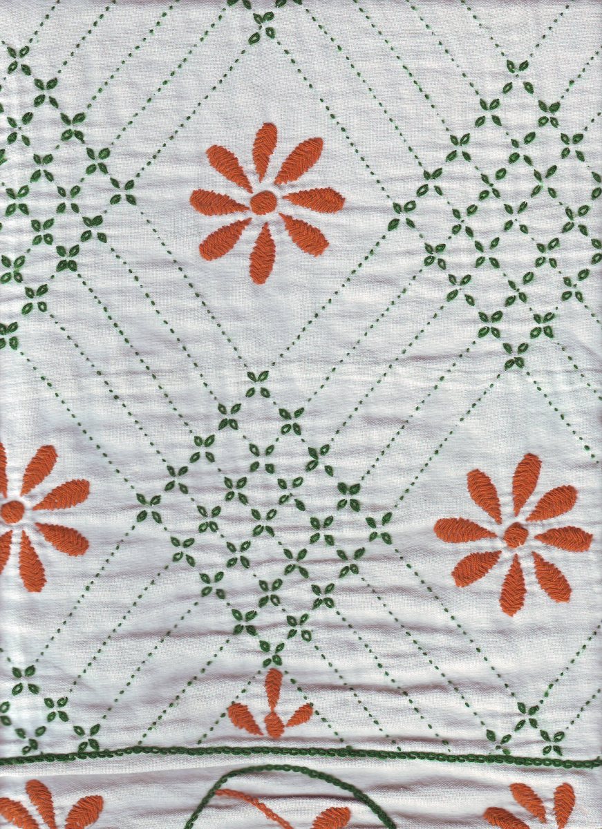 A flower motif stitched by hand