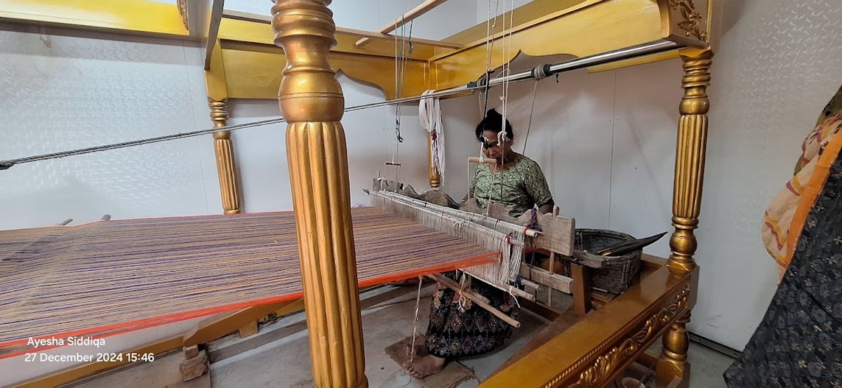 A Rakhine weaver in Kuakata