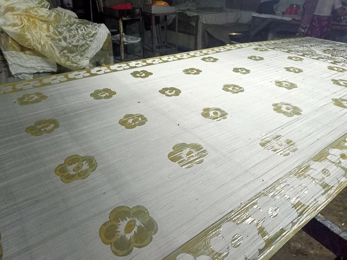 Silk on the loom at a mill in Sopura, Rajshahi